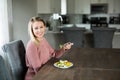 A young and attractive woman eating vegetables Royalty Free Stock Photo