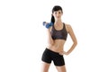 Young attractive woman exercising with dumbbells Royalty Free Stock Photo