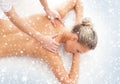 Young attractive woman getting spa treatment on the snow Royalty Free Stock Photo