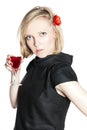 Young attractive woman holding a glass of red wine Royalty Free Stock Photo