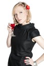 Young attractive woman holding a glass of red wine Royalty Free Stock Photo