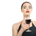 Young attractive woman holding glass of red wine. Royalty Free Stock Photo