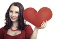 Young attractive woman holding heart and smiling