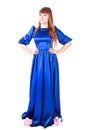 Young attractive woman in a long blue evening dress Royalty Free Stock Photo