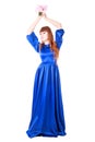 Young attractive woman in a long blue evening dress Royalty Free Stock Photo