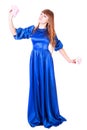 Young attractive woman in a long blue evening dress Royalty Free Stock Photo