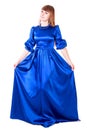 Young attractive woman in a long blue evening dress Royalty Free Stock Photo