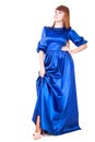 Young attractive woman in a long blue evening dress Royalty Free Stock Photo