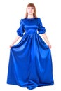 Young attractive woman in a long blue evening dress Royalty Free Stock Photo