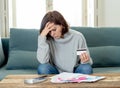 Upset young woman stressed about credit card debts and payments not happy accounting finances Royalty Free Stock Photo