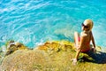 Young attractive woman near the water Royalty Free Stock Photo