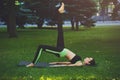 Young attractive woman practicing yoga outdoors Royalty Free Stock Photo