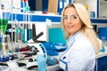 Young attractive woman scientist researching in the laboratory