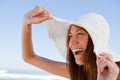 Young attractive woman screaming of joy in front of the sea Royalty Free Stock Photo