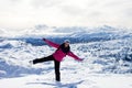 Young attractive woman, skiing in Austrian ski resort on a sunny Royalty Free Stock Photo