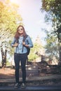 Young attractive woman take some resting while traveling at phnom rung temple in thailand.