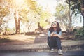 Young attractive woman take some resting while traveling at phnom rung temple in thailand.