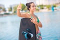 Young attractive woman with wakeboard Royalty Free Stock Photo