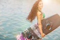 Young attractive woman with wakeboard Royalty Free Stock Photo