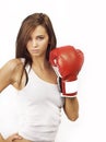 Young attractive woman wearing red boxing gloves