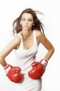 Young attractive woman wearing red boxing gloves