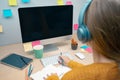 Young attractive woman working from home on her workplace. Royalty Free Stock Photo