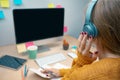 Young attractive woman working from home on her workplace. Royalty Free Stock Photo