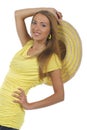 Young attractive woman with yellow shirt and strawhat Royalty Free Stock Photo