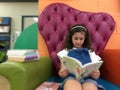 Young Australian girl reading a book