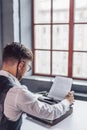 Young author by the window Royalty Free Stock Photo