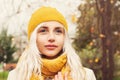 Young Autumn Woman wearing Yellow Hat and Scarf