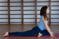 Young awesome happy woman developing flexibility. full length photo.yoga practise