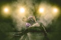 Young b-boy dancer doing break dance Royalty Free Stock Photo