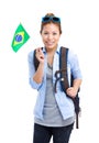 Young backpack holding brazilian flag