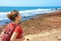 Young backpacker exploring Tenerife Island in her travel vacation on Canary Islands. Copy space Royalty Free Stock Photo