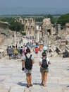 Two young backpacker tourists in Ephesus ancient city