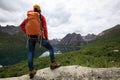 Backpacking woman hiking in mountains Royalty Free Stock Photo