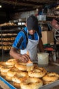 Young baker working in a country town in Colombia.