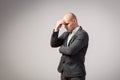 A young bald man in suit Royalty Free Stock Photo