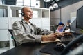 Young bald man working in a call center office Royalty Free Stock Photo