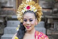 Young balinese dancer smiling in the temple Royalty Free Stock Photo