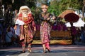 Young Balinese dancers at Denpasar street Royalty Free Stock Photo