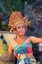 Young Balinese female dancer performing traditional dance Royalty Free Stock Photo