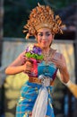 Young Balinese female dancer performing traditional dance Royalty Free Stock Photo