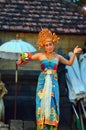 Young Balinese female dancer performing traditional dance Royalty Free Stock Photo