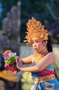 Young Balinese female dancer performing traditional dance Royalty Free Stock Photo