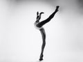 young ballerina in a bodysuit performs an attitude Royalty Free Stock Photo