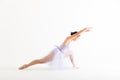 Young Ballerina Rehearsing With Arms Raised And Legs Apart