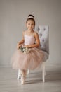 Young ballerina stands on pointes