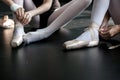 Young ballerinas putting their pointes on Royalty Free Stock Photo